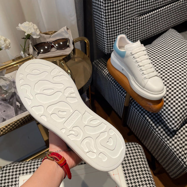 OVERSIZED SNEAKERS IN WHITE CALFSKIN WITH BLUE RUBBER HEEL TAB