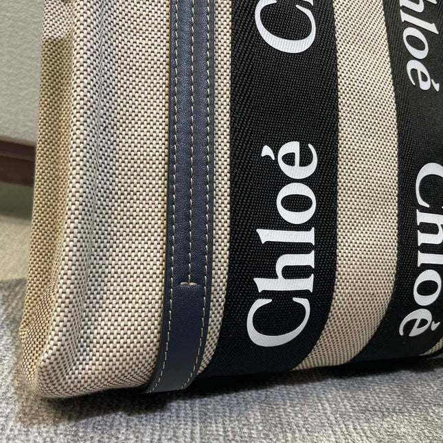 SMALL STRAP WOODY TOTE BAG 26.5 IN BEIGE LINEN CANVAS BLACK WEBBING DARK BLUE CALFSKIN