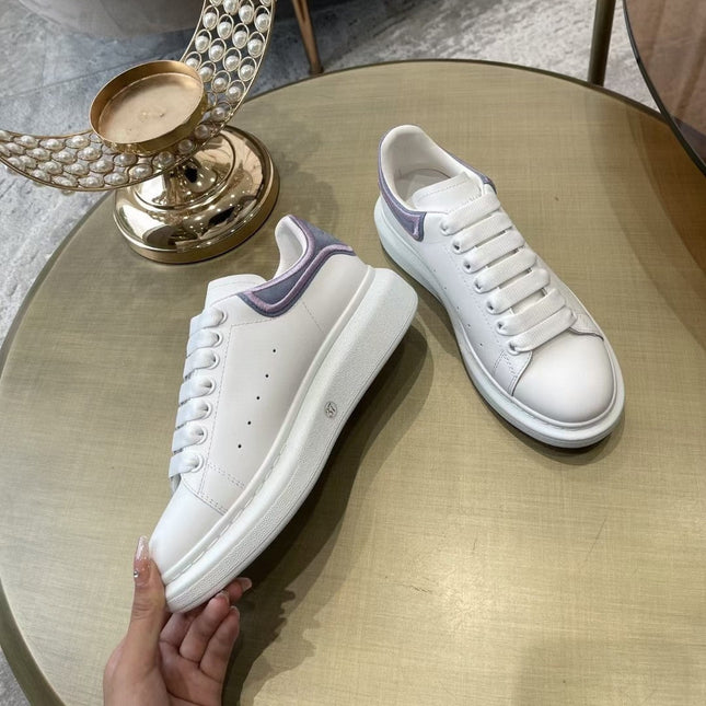 OVERSIZED SNEAKER IN WHITE CALFSKIN WITH PURPLE SUEDE HEEL TAB