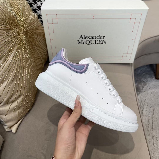OVERSIZED SNEAKER IN WHITE CALFSKIN WITH PURPLE SUEDE HEEL TAB
