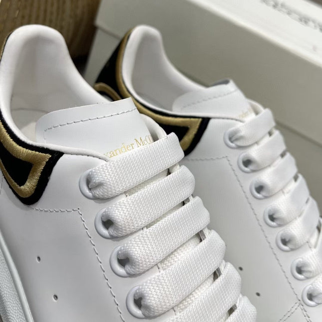 OVERSIZED SNEAKER - WHITE CALFSKIN WITH BLACK SUEDE AND GOLD STITCHED HEEL TAB
