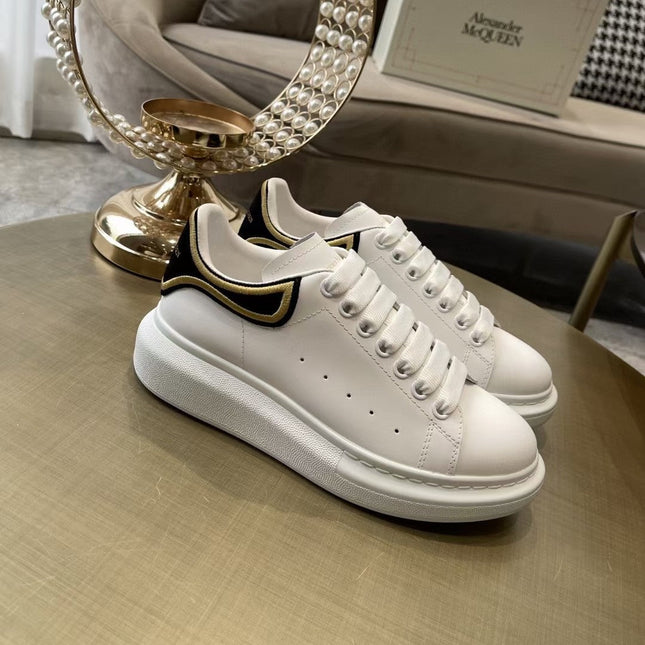OVERSIZED SNEAKER - WHITE CALFSKIN WITH BLACK SUEDE AND GOLD STITCHED HEEL TAB