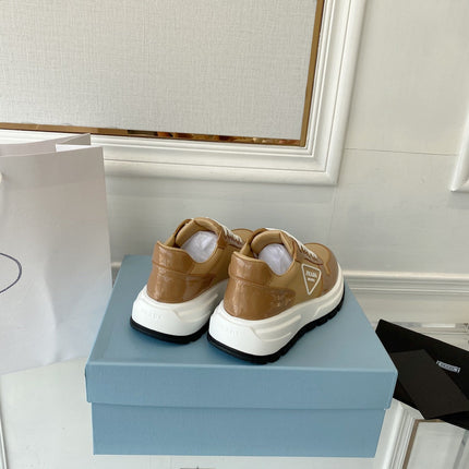 PRADA 25S THICK SOLE SNEAKER IN BROWN CALFSKIN AND CANVAS