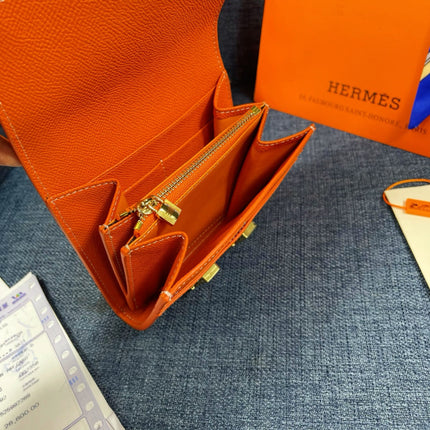 HM CONSTANCE 12 ORANGE CALFSKIN GOLD HARDWARE