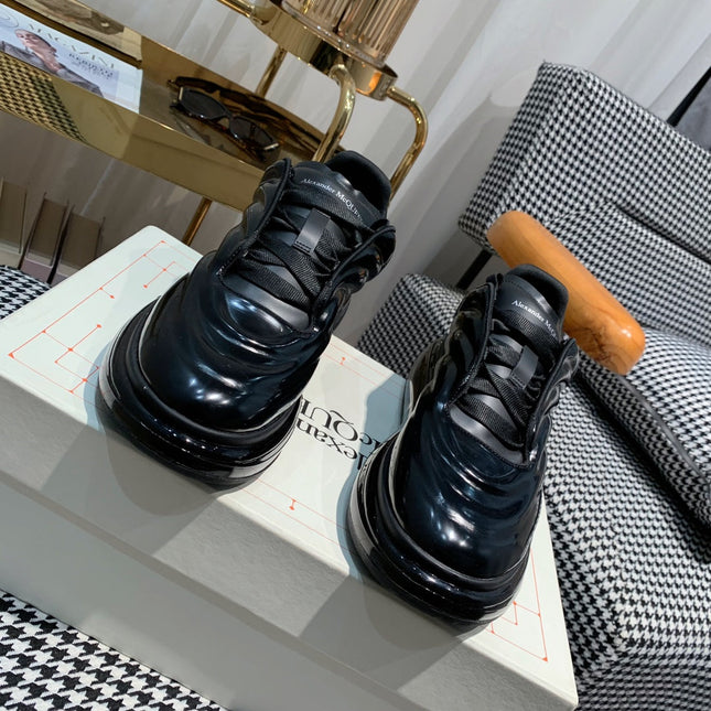 OVERSIZED SNEAKERS IN BLACK SHINY CALFSKIN WAVE PATTERN AND BLACK SOLE