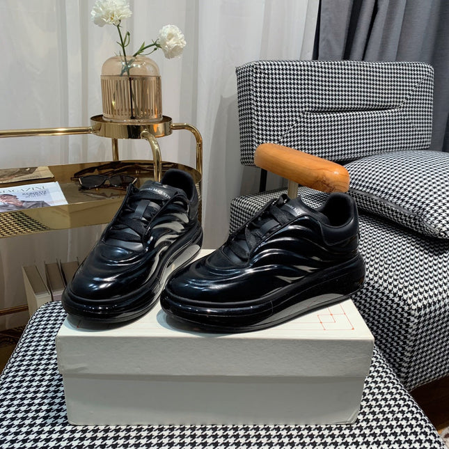 OVERSIZED SNEAKERS IN BLACK SHINY CALFSKIN WAVE PATTERN AND BLACK SOLE