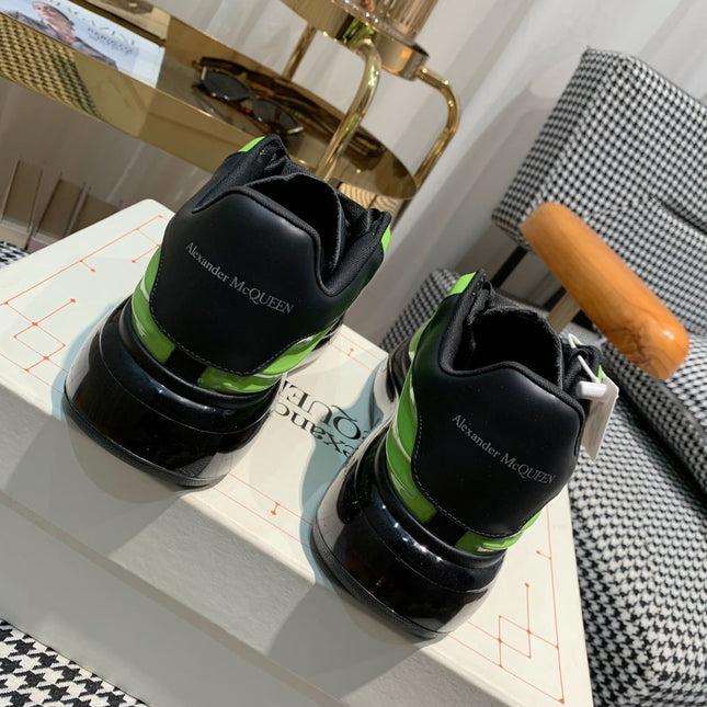 OVERSIZED SNEAKERS IN LIGHT GREEN SHINY CALFSKIN WAVE PATTERN AND BLACK SOLE