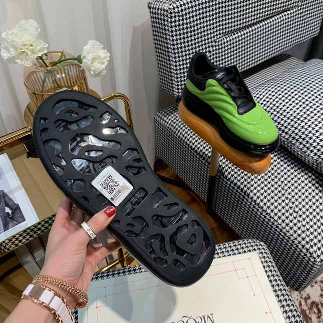 OVERSIZED SNEAKERS IN LIGHT GREEN SHINY CALFSKIN WAVE PATTERN AND BLACK SOLE