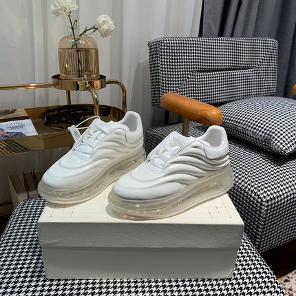 OVERSIZED SNEAKERS IN WHITE CALFSKIN WITH WAVE PATTERN AND CLEAR SOLE
