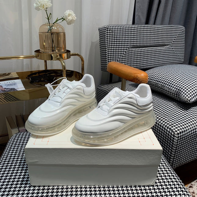 OVERSIZED SNEAKERS IN WHITE CALFSKIN WITH WAVE PATTERN AND CLEAR SOLE