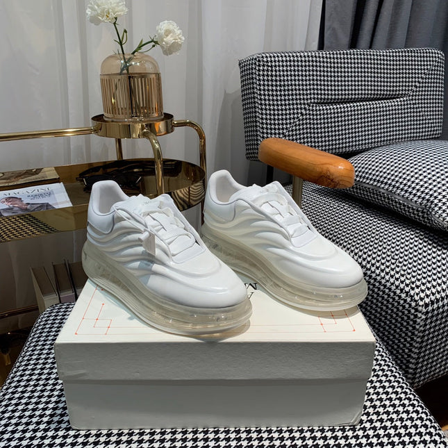 OVERSIZED SNEAKERS IN WHITE CALFSKIN WITH WAVE PATTERN AND CLEAR SOLE