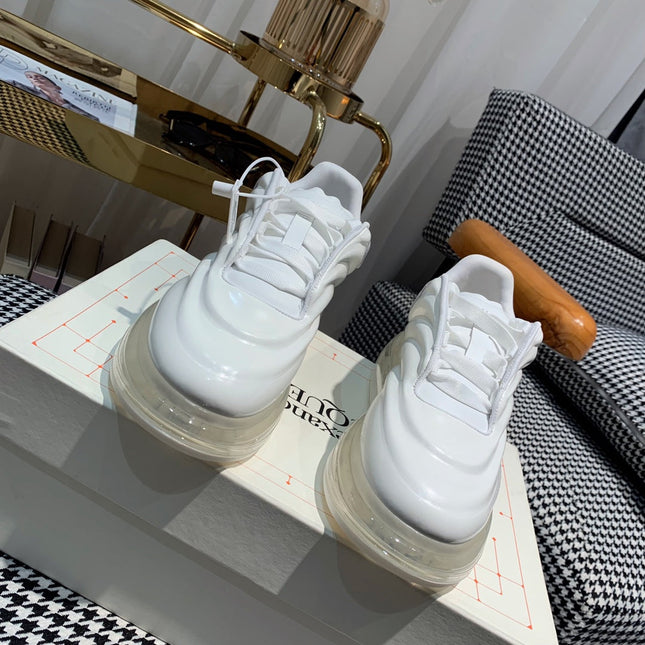 OVERSIZED SNEAKERS IN WHITE CALFSKIN WITH WAVE PATTERN AND CLEAR SOLE