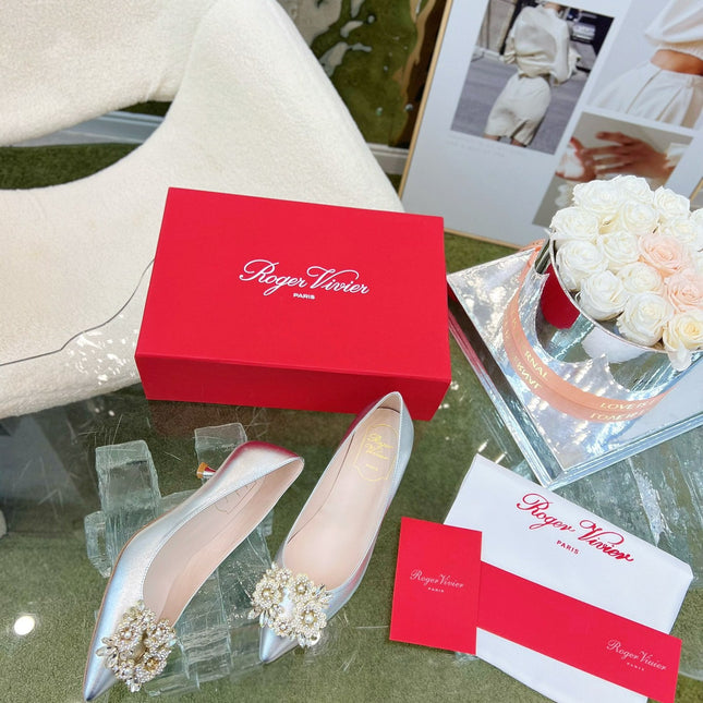 EFFLORESCENCE POINTED-TOE PUMPS IN SILVER SATIN WITH CRYSTAL BUCKLE