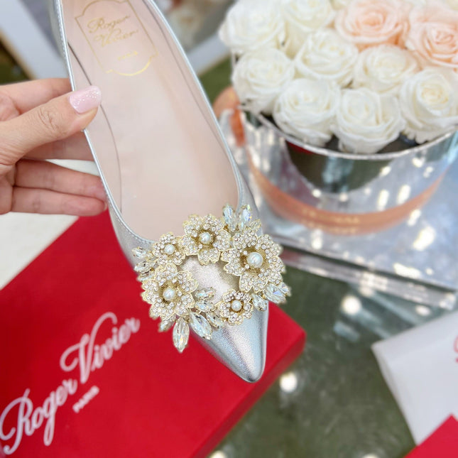 EFFLORESCENCE POINTED-TOE PUMPS IN SILVER SATIN WITH CRYSTAL BUCKLE