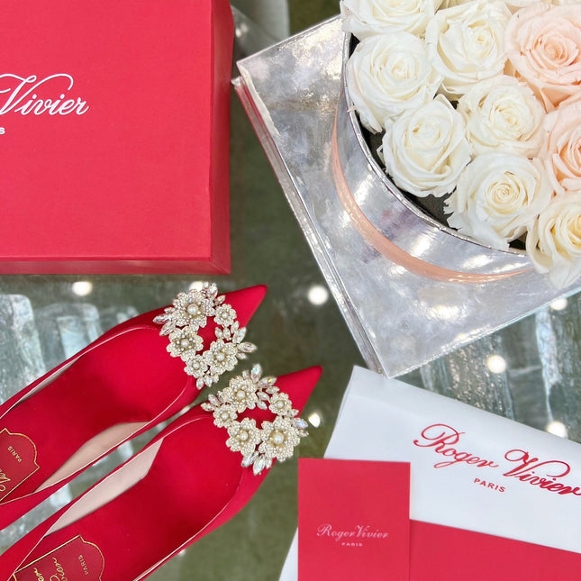 EFFLORESCENCE POINTED-TOE PUMPS IN RED SATIN WITH CRYSTAL BUCKLE