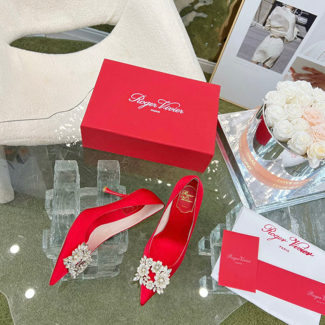 EFFLORESCENCE POINTED-TOE PUMPS IN RED SATIN WITH CRYSTAL BUCKLE