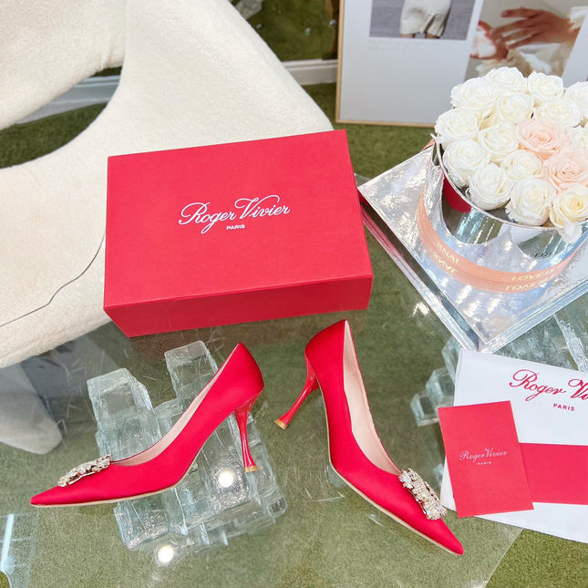 EFFLORESCENCE POINTED-TOE PUMPS IN RED SATIN WITH CRYSTAL BUCKLE