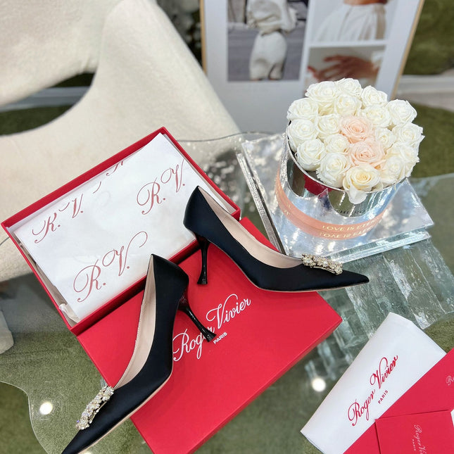 EFFLORESCENCE POINTED-TOE PUMPS IN BLACK SATIN WITH CRYSTAL BUCKLE