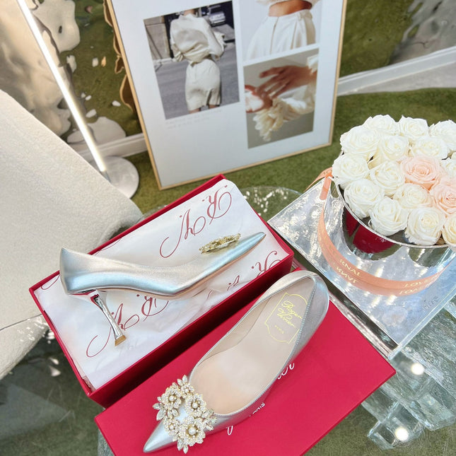 EFFLORESCENCE POINTED-TOE PUMPS 85MM IN SILVER SATIN WITH CRYSTAL BUCKLE