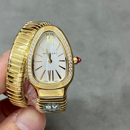 SERPENTI TUBOGAS QUARTZ YELLOW GOLD ATTACHED DIAMOND BEZEL SILVER OPALINE DIAL