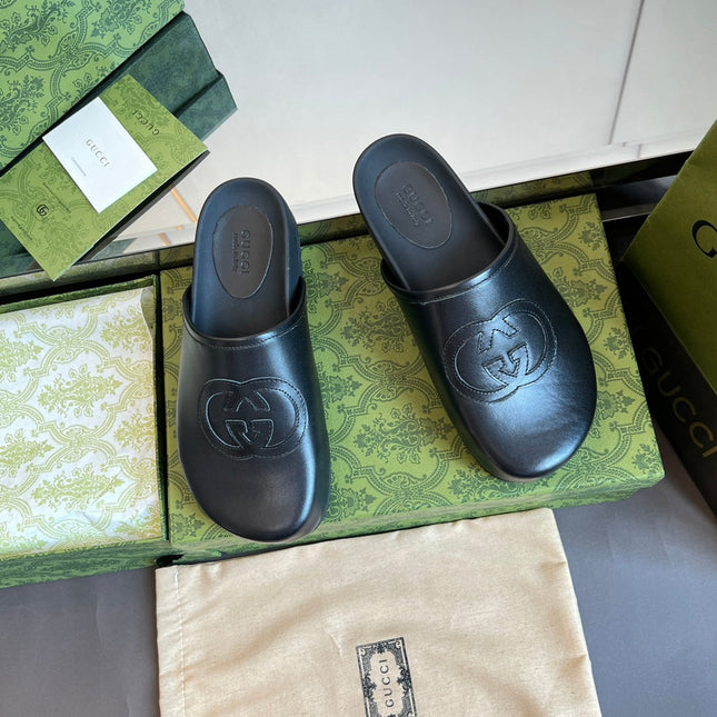 INTERLOCKING G MULE IN BLACK CALFSKIN