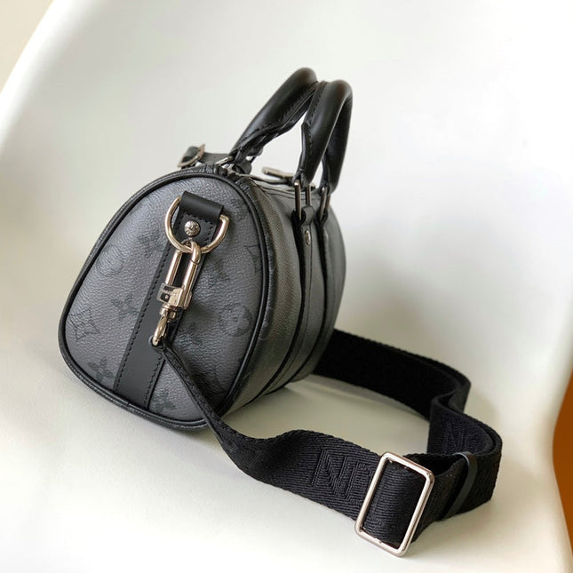 KEEPALL BANDOULIÈRE 25 IN BLACK MONOGRAM HERITAGE CANVAS