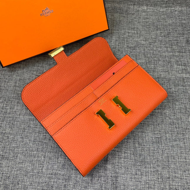 HM CLUTCH CONSTANCE 22 ORANGE CALFSKIN GOLD HARDWARE