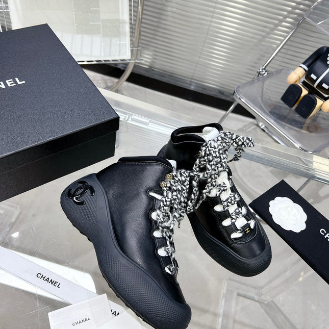 CC CANO ALTO SNEAKER IN BLACK CALFSKIN AND RUBBER