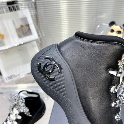 CC CANO ALTO SNEAKER IN BLACK CALFSKIN AND RUBBER