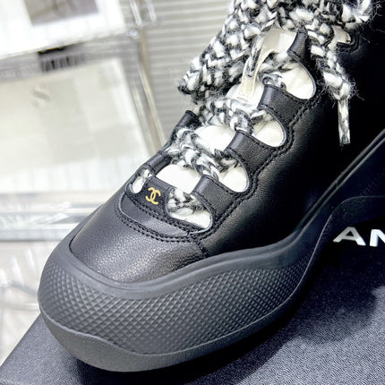 CC CANO ALTO SNEAKER IN BLACK CALFSKIN AND RUBBER