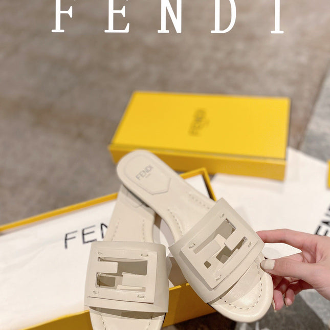 FENDI BAGUETTE SLIDES IN WHITE LAMBSKIN