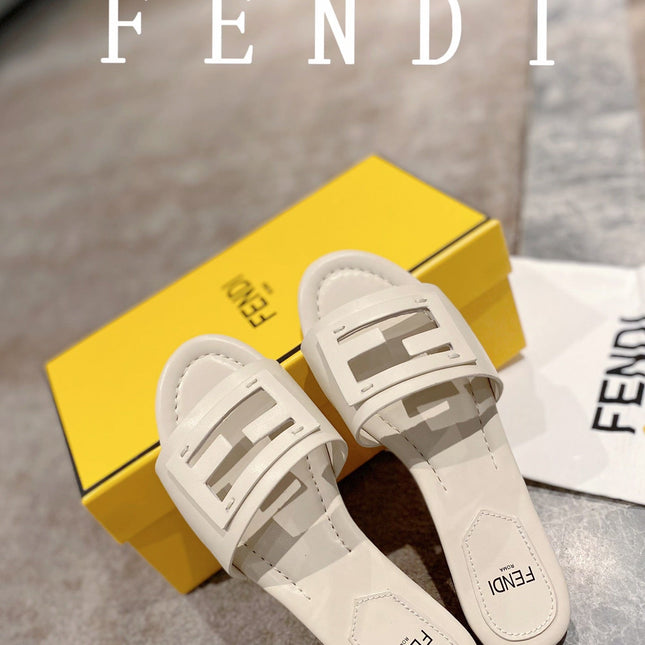 FENDI BAGUETTE SLIDES IN WHITE LAMBSKIN