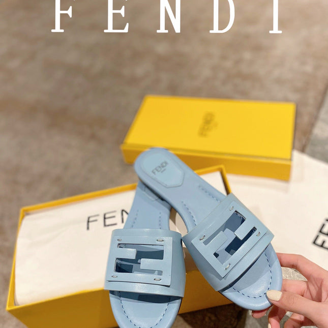 FENDI BAGUETTE SLIDES IN  BABY BLUE LAMBSKIN