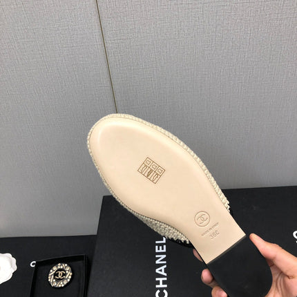 HALF-MULES IN CREAM WOOL WOVEN