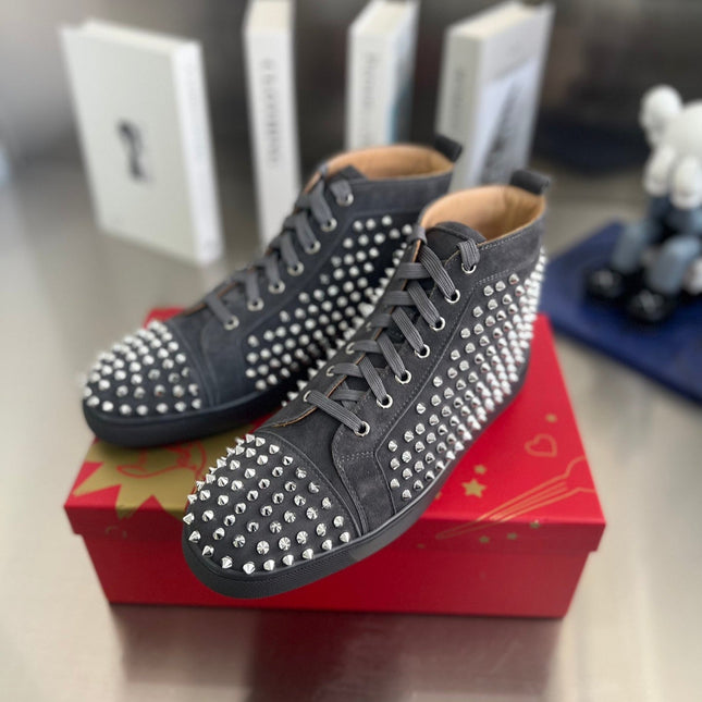 SPIKE STUDDED HIGH-TOP SNEAKERS IN BLACK CALFSKIN