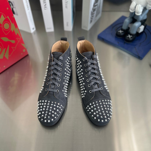 SPIKE STUDDED HIGH-TOP SNEAKERS IN BLACK CALFSKIN