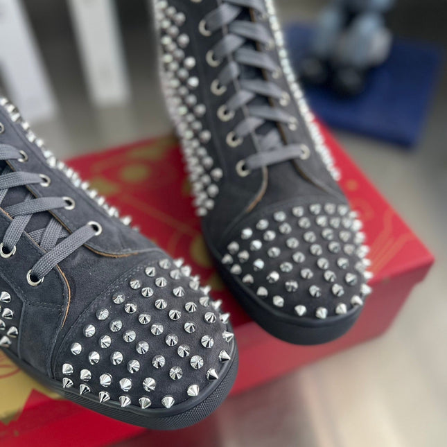 SPIKE STUDDED HIGH-TOP SNEAKERS IN BLACK CALFSKIN