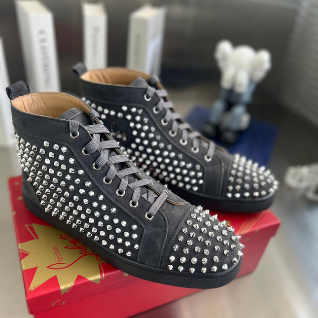 SPIKE STUDDED HIGH-TOP SNEAKERS IN BLACK CALFSKIN