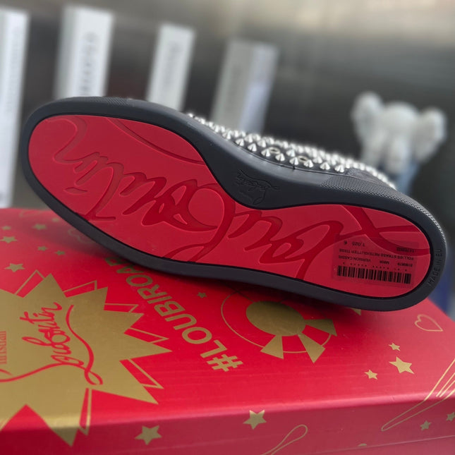 SPIKE STUDDED HIGH-TOP SNEAKERS IN BLACK CALFSKIN