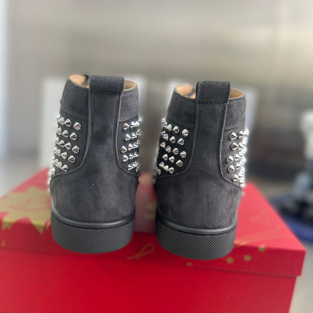 SPIKE STUDDED HIGH-TOP SNEAKERS IN BLACK CALFSKIN