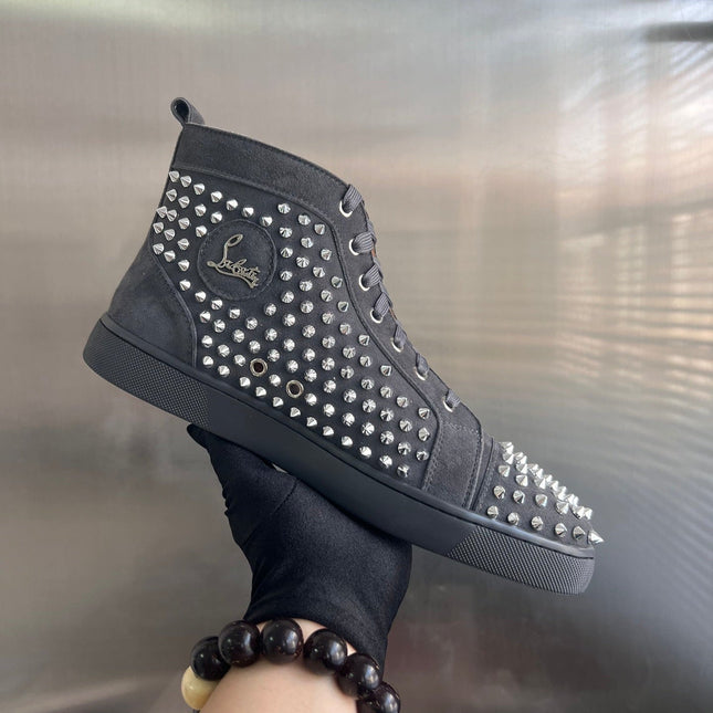 SPIKE STUDDED HIGH-TOP SNEAKERS IN BLACK CALFSKIN