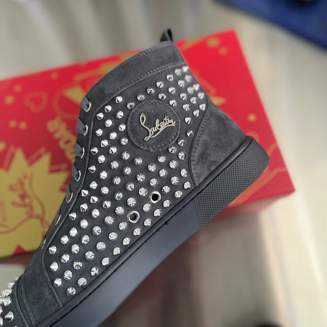 SPIKE STUDDED HIGH-TOP SNEAKERS IN BLACK CALFSKIN