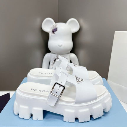 MONOLITH SLIPPER SANDALS IN WHITE RUBBER