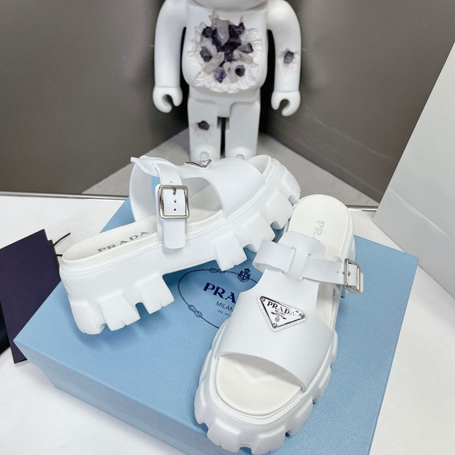 MONOLITH SLIPPER SANDALS IN WHITE RUBBER