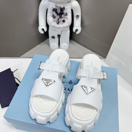 MONOLITH SLIPPER SANDALS IN WHITE RUBBER