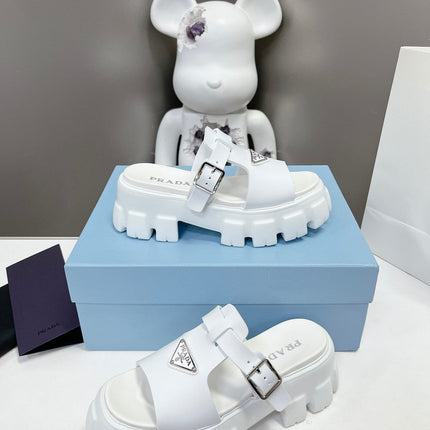 MONOLITH SLIPPER SANDALS IN WHITE RUBBER