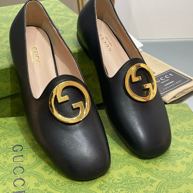 BLONDIE LOGO-PLAQUE LOAFERS IN BLACK CALFSKIN WITH GOLD HARDWARE