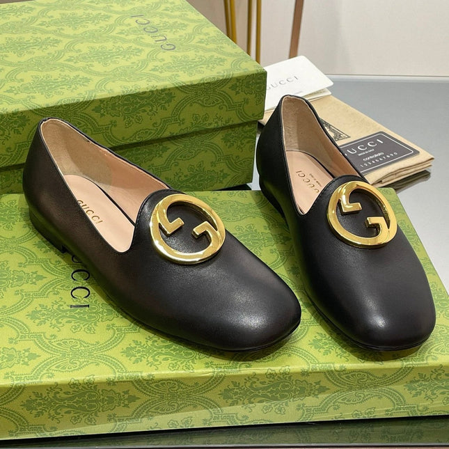 BLONDIE LOGO-PLAQUE LOAFERS IN BLACK CALFSKIN WITH GOLD HARDWARE