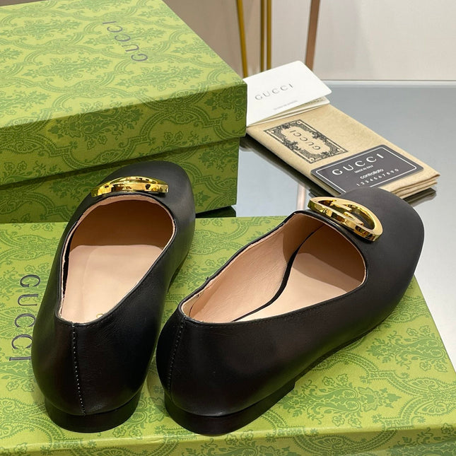 BLONDIE LOGO-PLAQUE LOAFERS IN BLACK CALFSKIN WITH GOLD HARDWARE