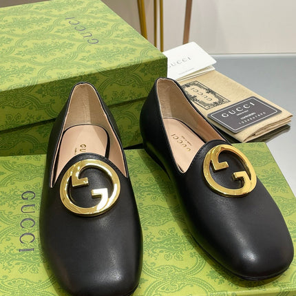 BLONDIE LOGO-PLAQUE LOAFERS IN BLACK CALFSKIN WITH GOLD HARDWARE